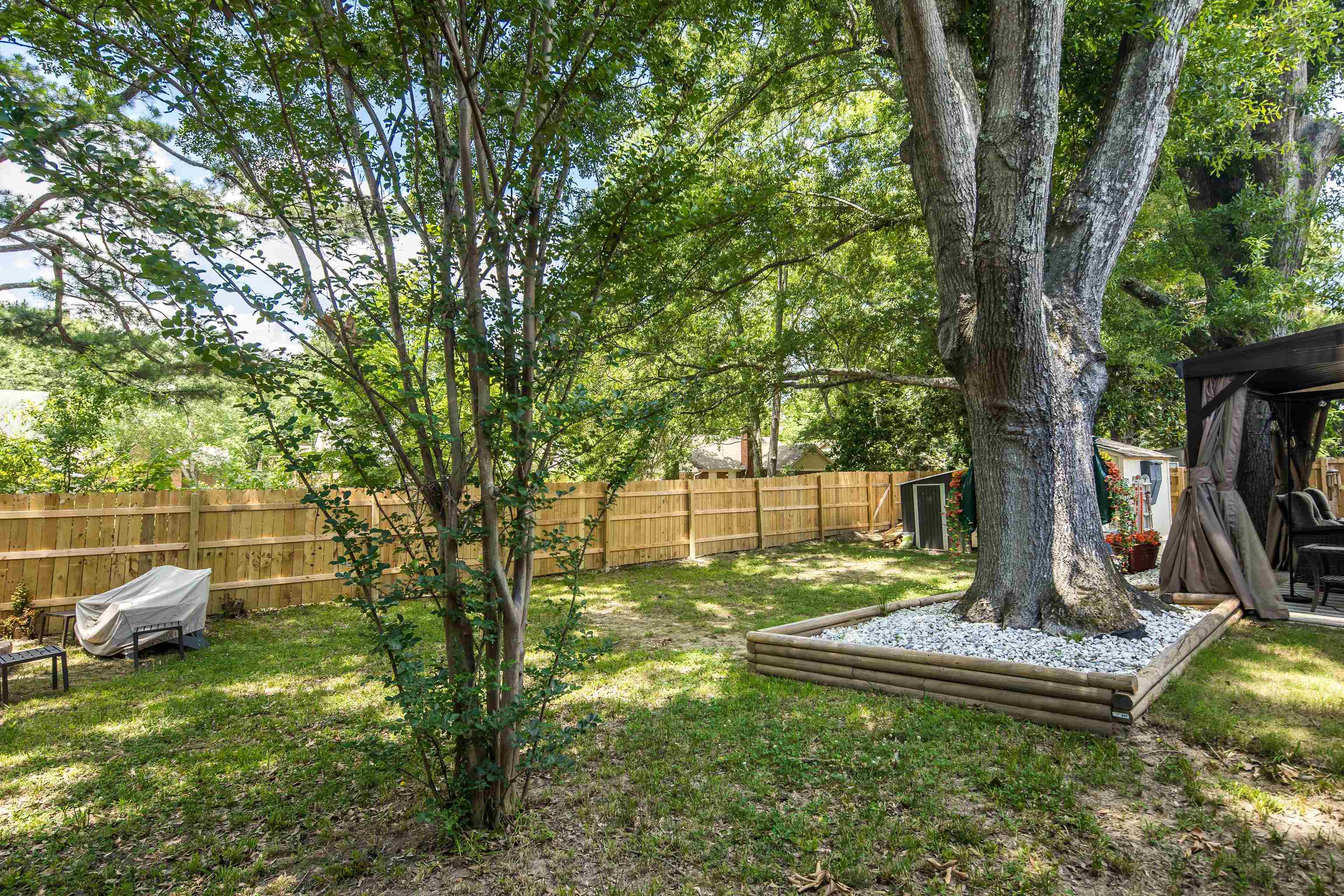 1137 Greenview Road Collierville, TN 38017 - Photo 33 of 35 a view of a backyard with large trees