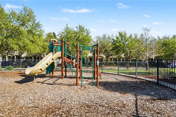 a view of a park with swings