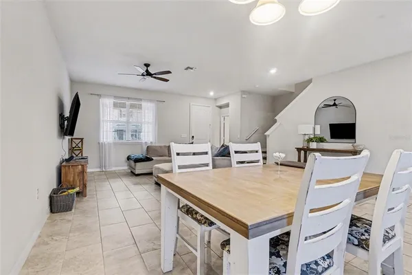 a kitchen with stainless steel appliances kitchen island a white counter space and cabinets