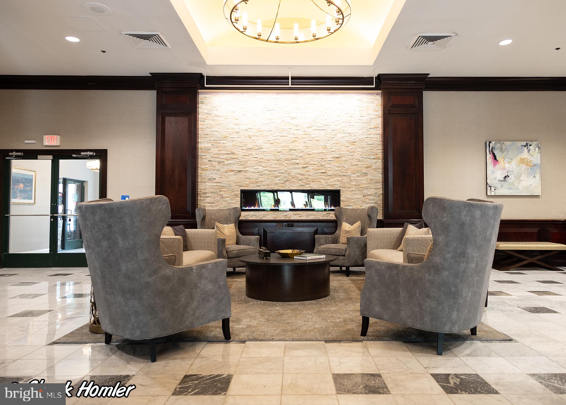 2001 Hamilton Street, Unit 2016 Philadelphia, PA 19130 - Photo 17 of 41 a living room with couches and a flat screen tv