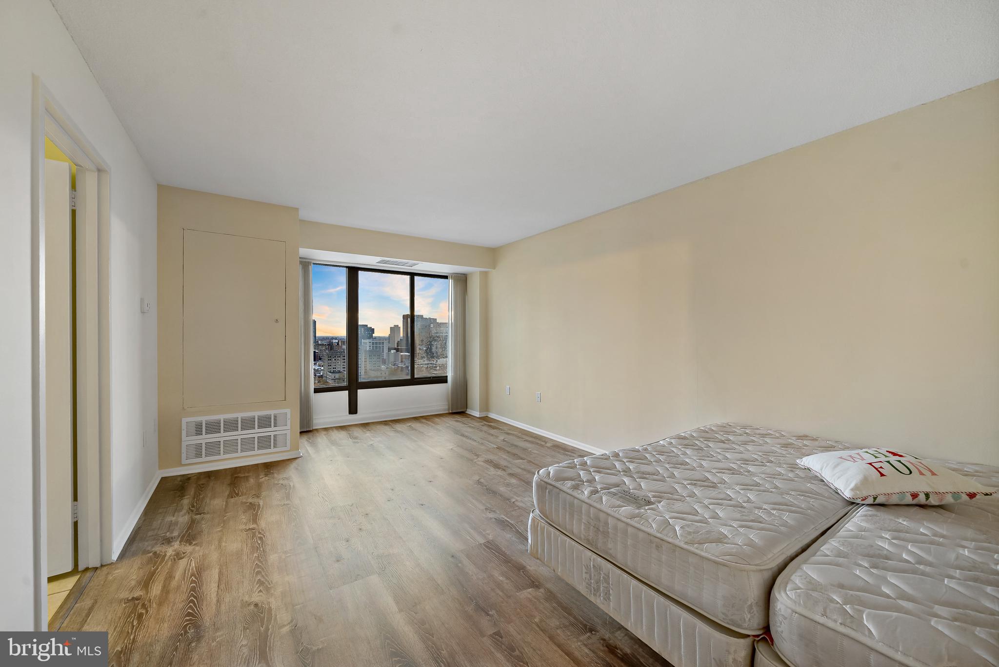 2001 Hamilton Street, Unit 2016 Philadelphia, PA 19130 - Photo 3 of 41 a view of an empty room and window