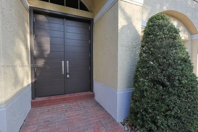 a view of a room with wooden floor and walls