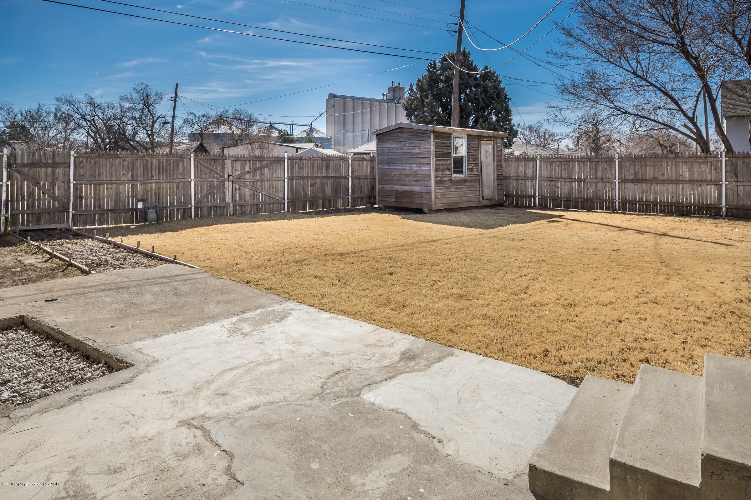 4215 South Harrison Street Amarillo, TX 79110 - Photo 14 of 15 a house with pool in front of it