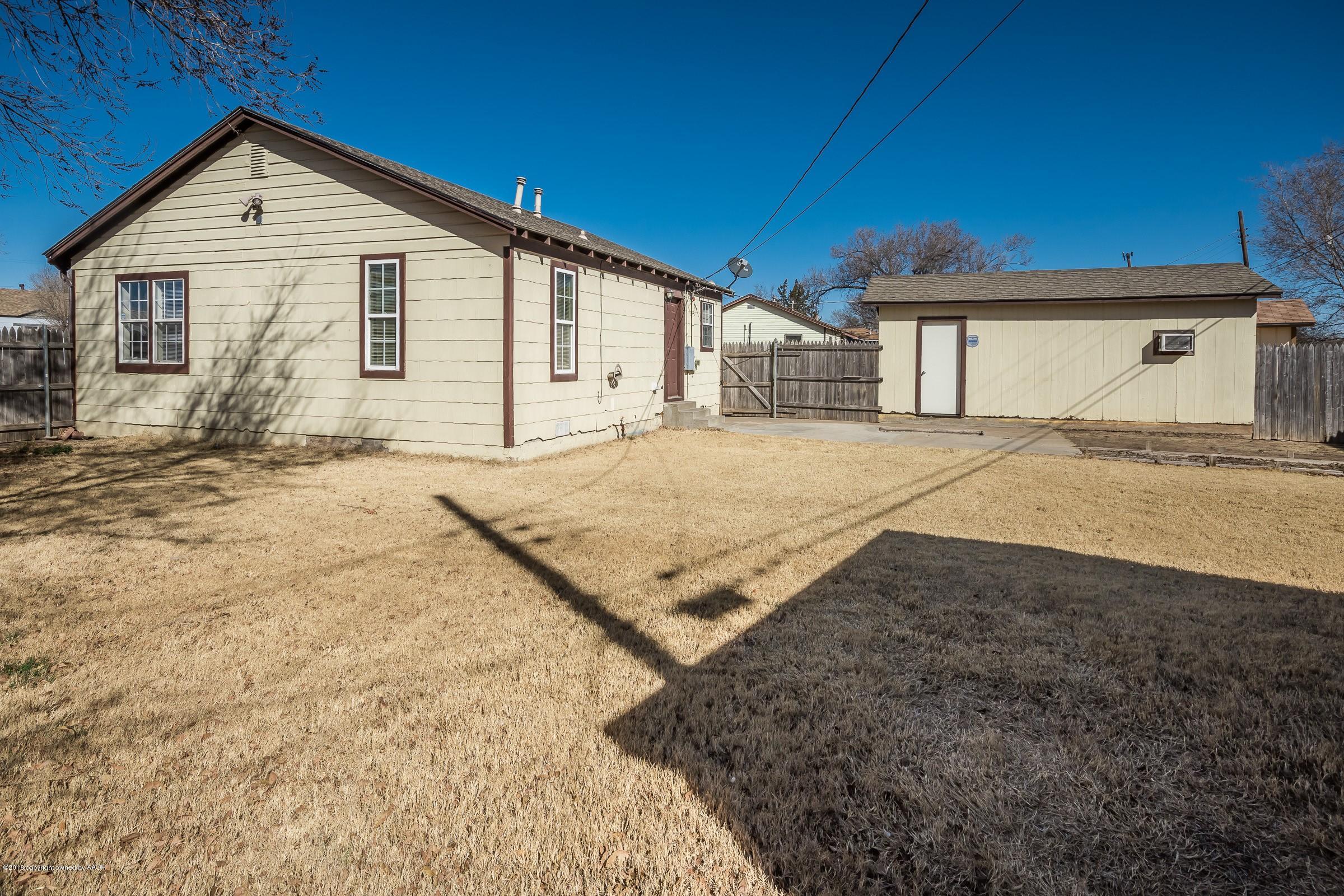 4215 South Harrison Street Amarillo, TX 79110 - Photo 15 of 15 a view of a house with a backyard
