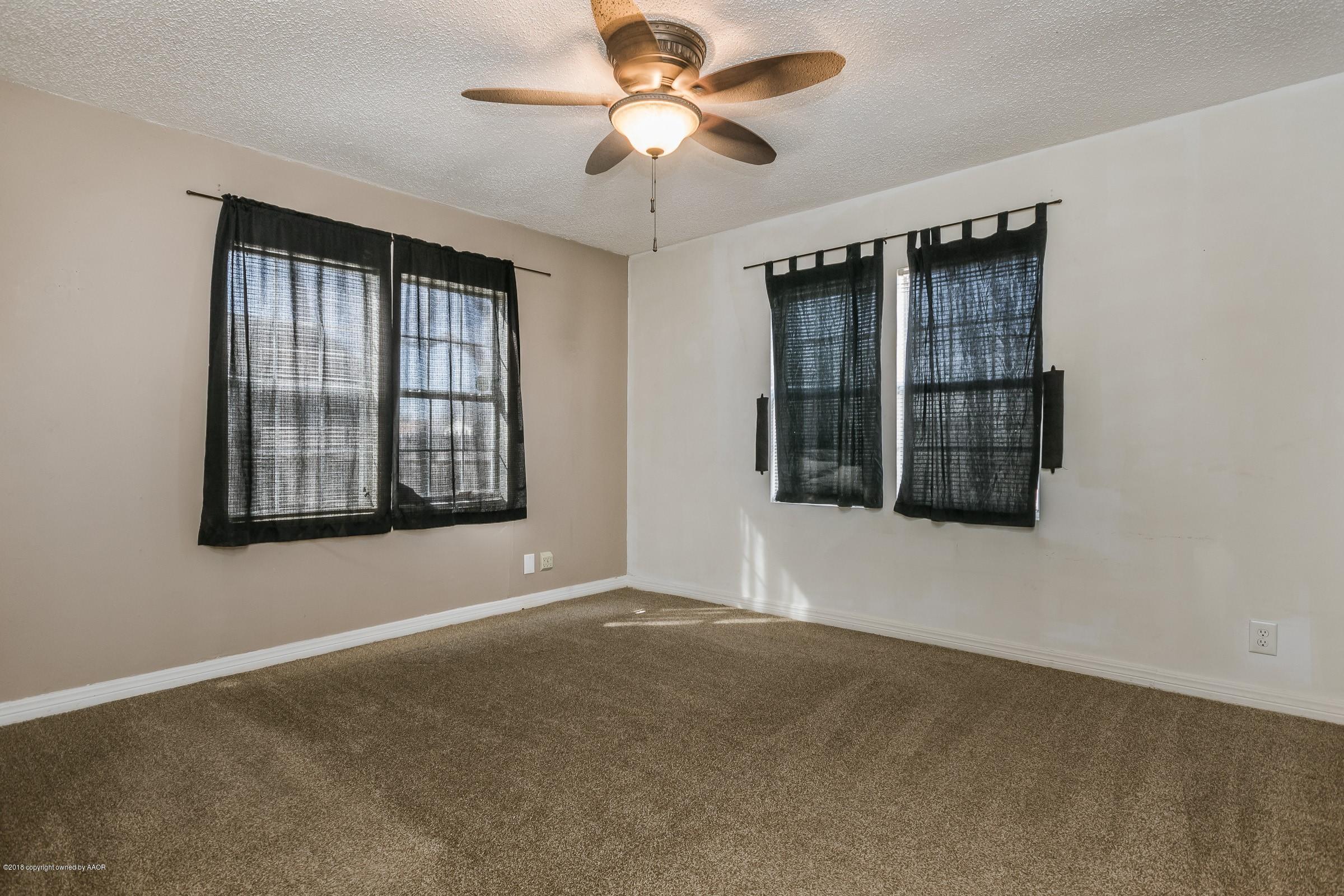4215 South Harrison Street Amarillo, TX 79110 - Photo 10 of 15 a view of an empty room with a window