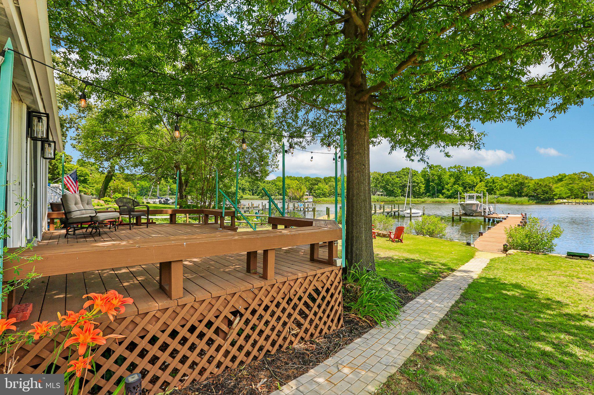 Serene lakeside retreat with lush greenery.