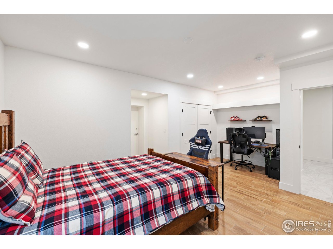 37179 Soaring Eagle Circle Severance, CO 80550 - Photo 32 of 40 a bed room with a bed and a television