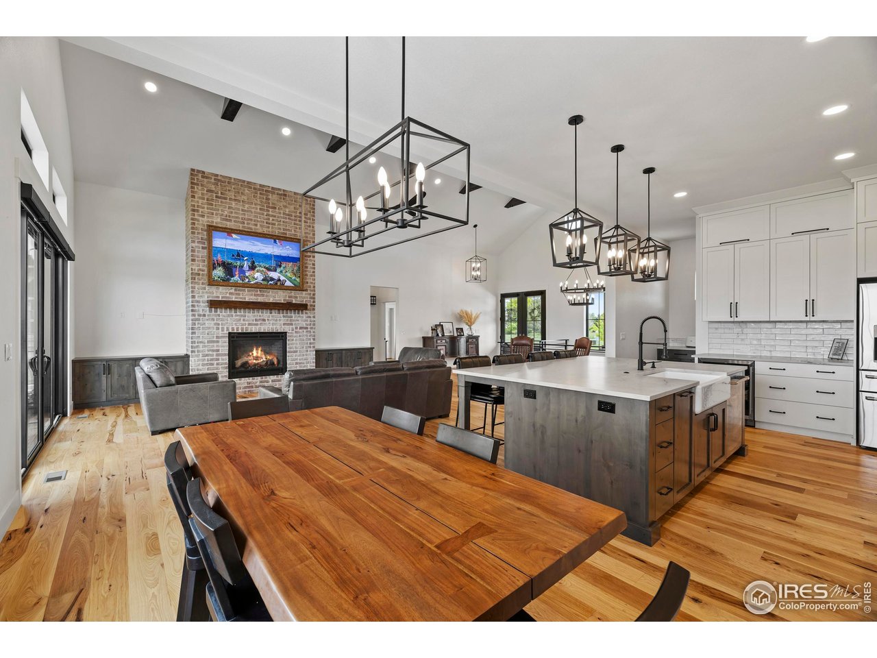 37179 Soaring Eagle Circle Severance, CO 80550 - Photo 10 of 40 a open kitchen with sink and cabinets
