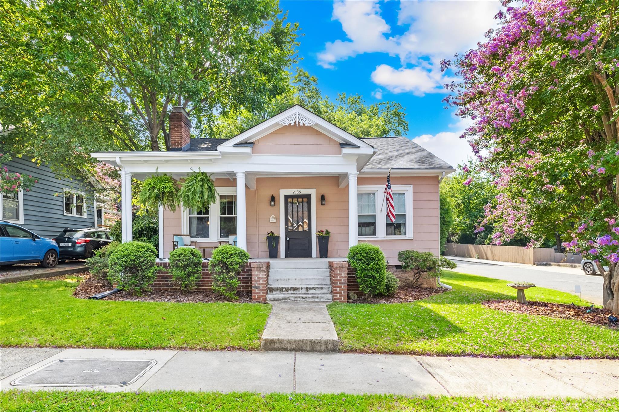 2135 Scott Avenue Charlotte, NC 28203 - Photo 1 of 48 a front view of a house with garden