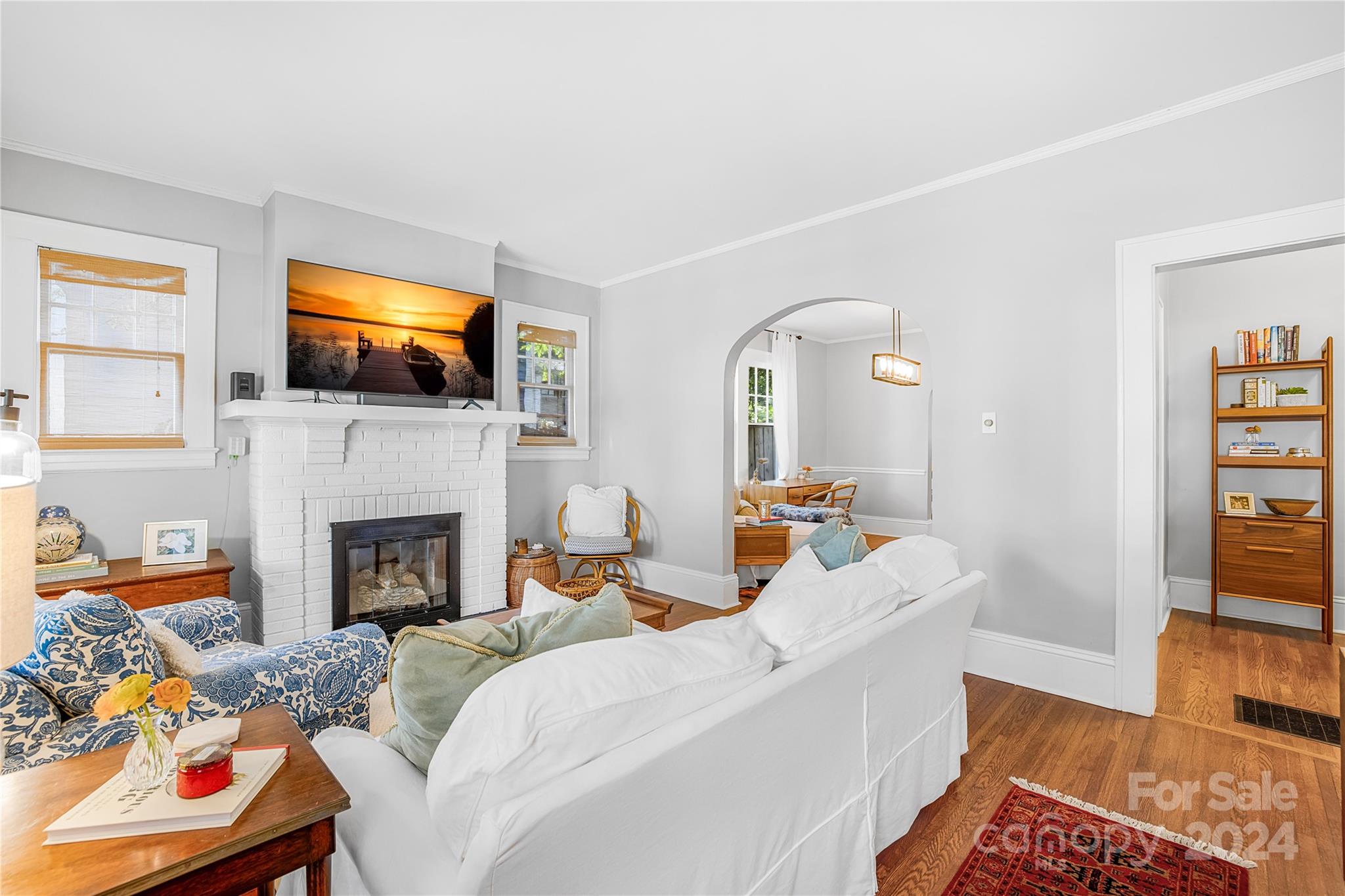 2135 Scott Avenue Charlotte, NC 28203 - Photo 18 of 48 a living room with furniture fireplace and flat screen tv