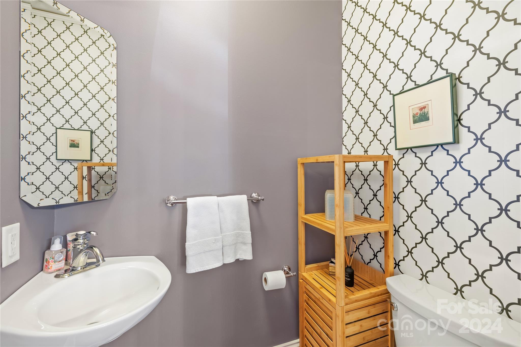 2135 Scott Avenue Charlotte, NC 28203 - Photo 22 of 48 a bathroom with a sink and a mirror
