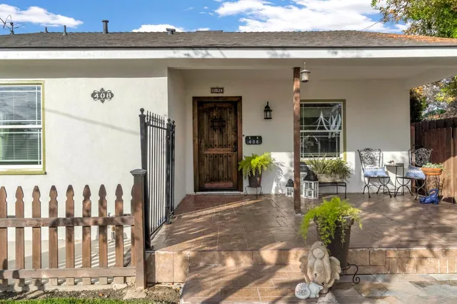 a view of living room filled with furniture