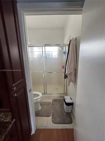 a bathroom with a sink and toilet