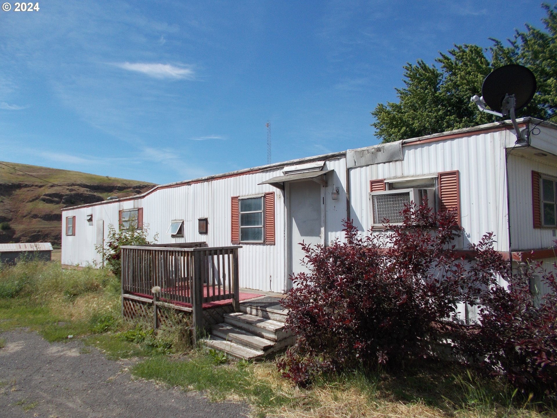 42886 Main Street Pendleton, OR 97801 - Photo 1 of 1 a view of backyard with deck and garden