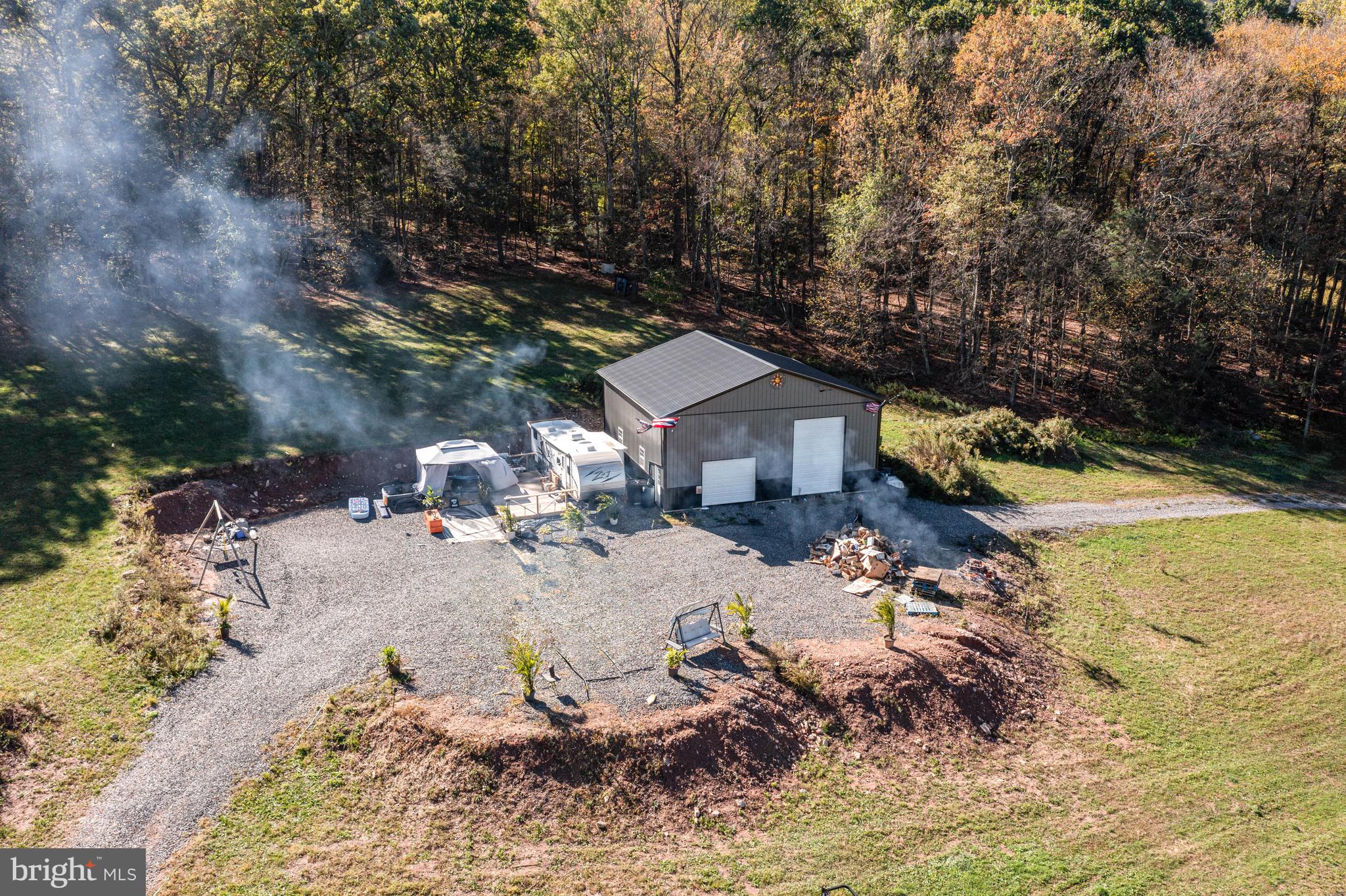 132 Turnpike Road Ashland, PA 17921 - Photo 15 of 20 a view of a house with a yard and sitting area