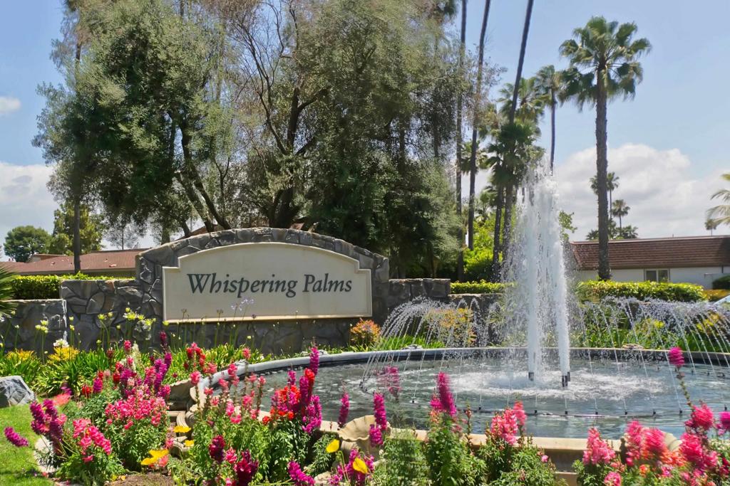 4074 Avenida Brisa Rancho Santa Fe, CA 92091 - Photo 1 of 32 a sign that is in front of flowers