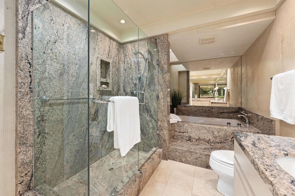 4074 Avenida Brisa Rancho Santa Fe, CA 92091 - Photo 16 of 32 a bathroom with a granite countertop sink toilet and shower