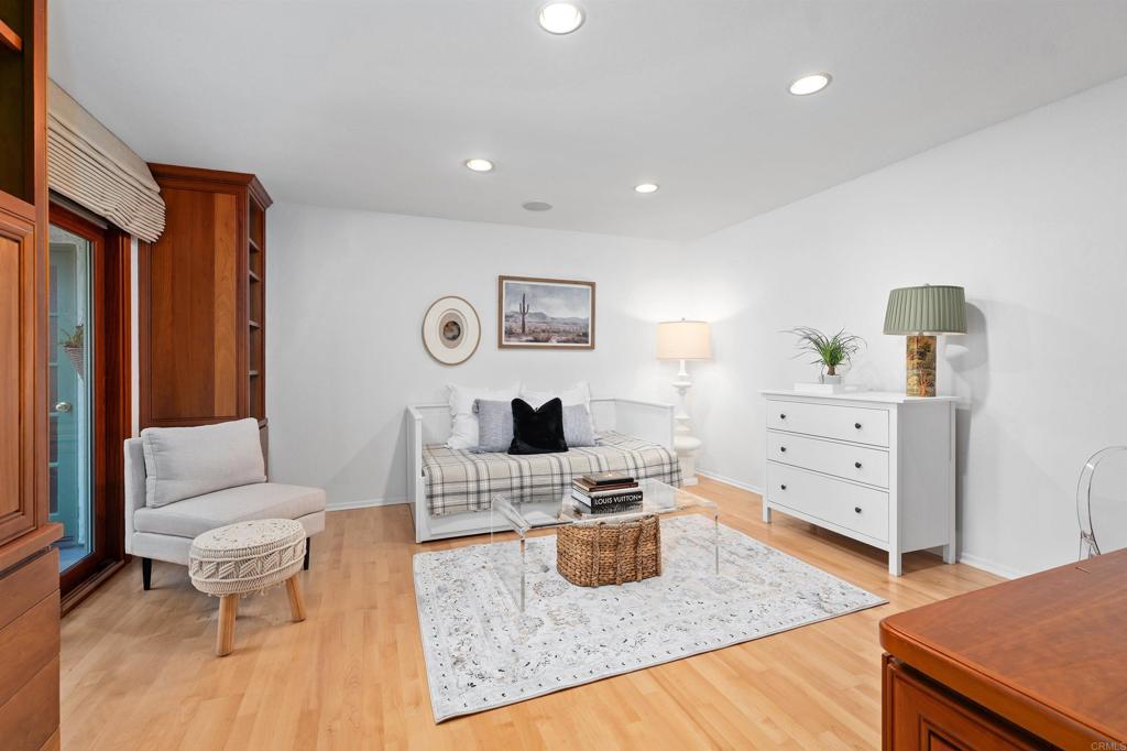 4074 Avenida Brisa Rancho Santa Fe, CA 92091 - Photo 17 of 32 a living room with furniture and wooden floor