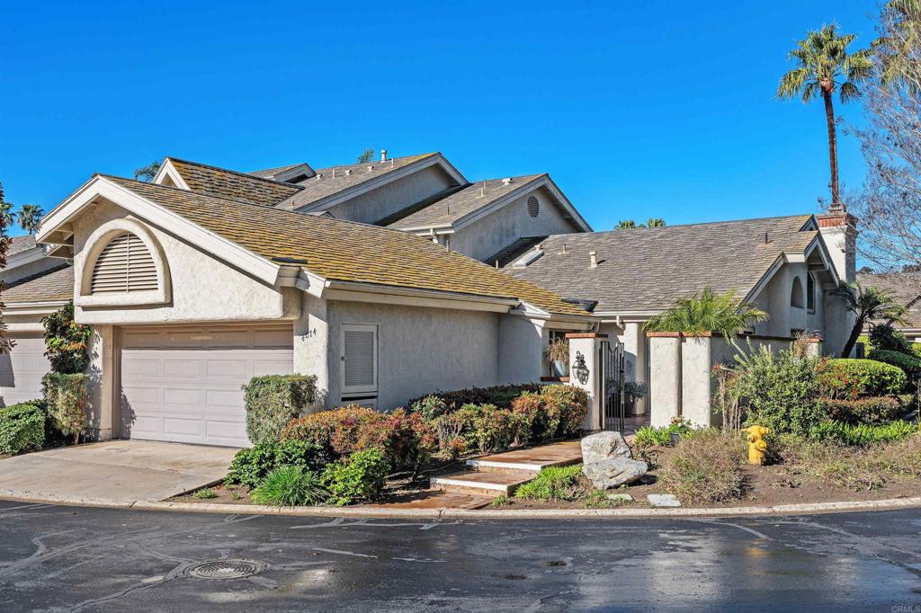 4074 Avenida Brisa Rancho Santa Fe, CA 92091 - Photo 2 of 32 a front view of a house with garden