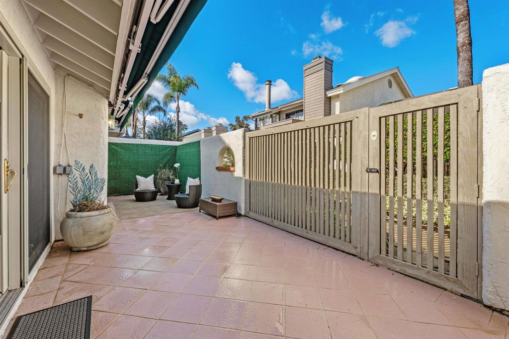 4074 Avenida Brisa Rancho Santa Fe, CA 92091 - Photo 23 of 32 a view of a patio with table and chairs and potted plants