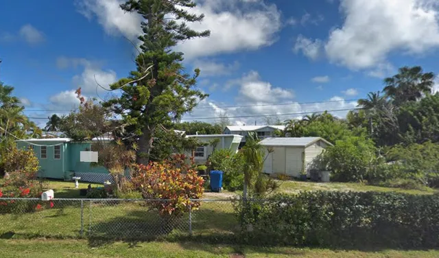a view of house with outdoor space
