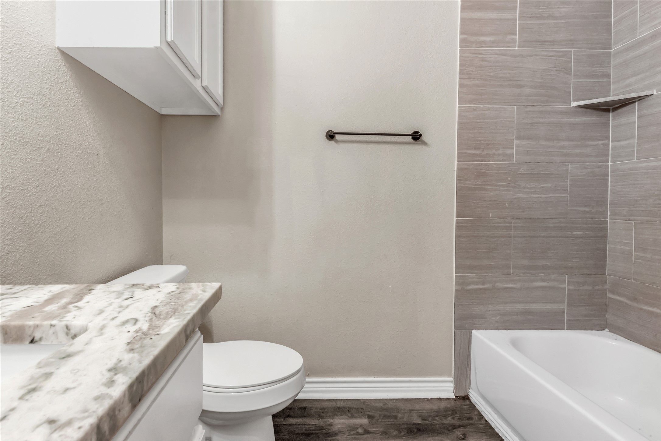 904 New York Street Bryan, TX 77803 - Photo 4 of 11 a bathroom with a sink and toilet