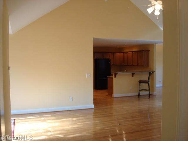 321 Morning Glory Road Madison, NC 27025 - Photo 4 of 16 Den/Family/Great Room. View of kitchen from Great Room. Gleaming hardwood floors.