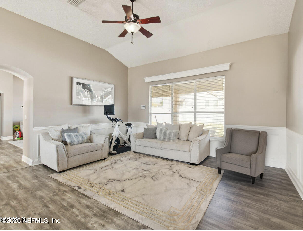 2955 Ravine Hill Drive Middleburg, FL 32068 - Photo 14 of 38 a living room with furniture and a large window