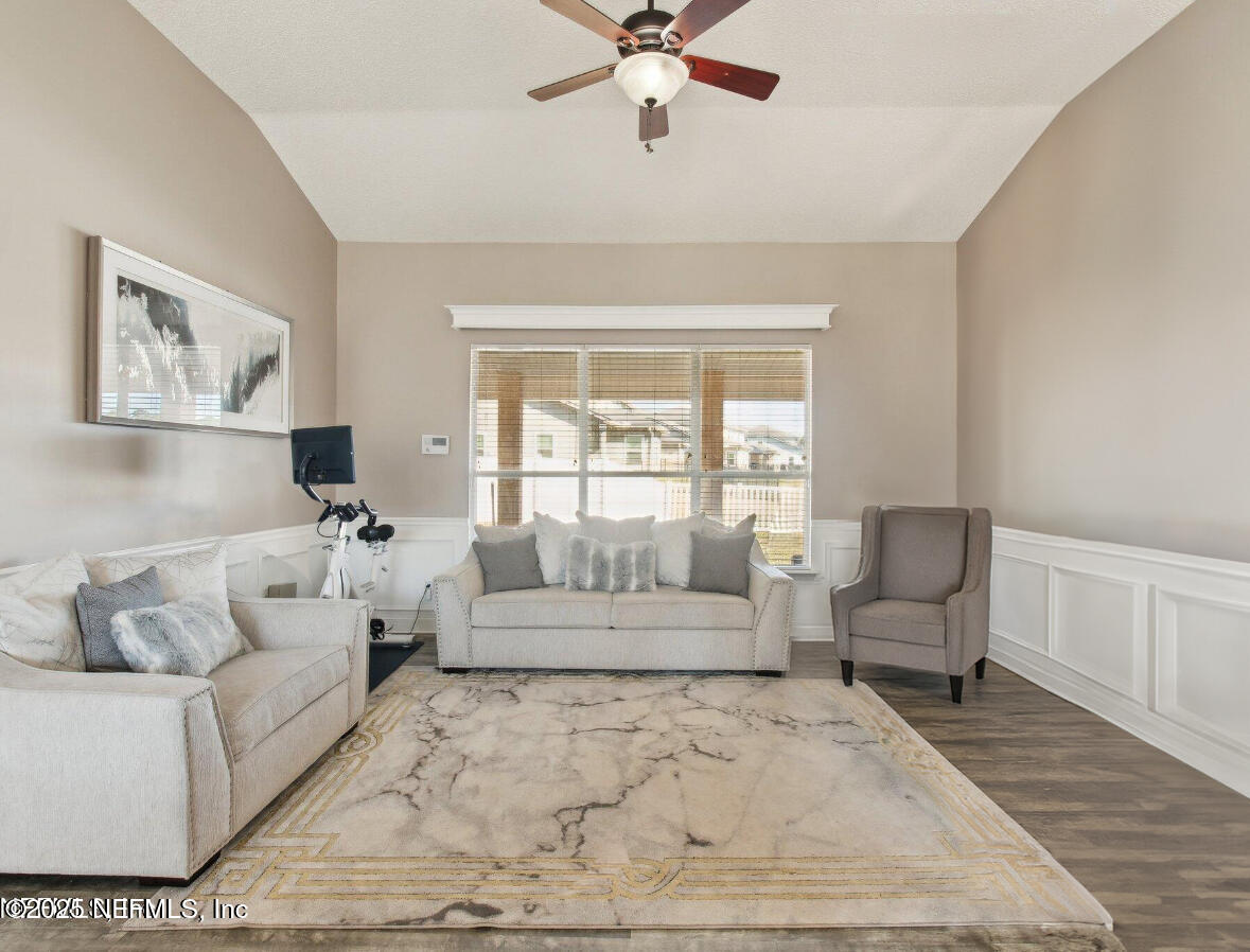 2955 Ravine Hill Drive Middleburg, FL 32068 - Photo 15 of 38 a living room with furniture and a large window