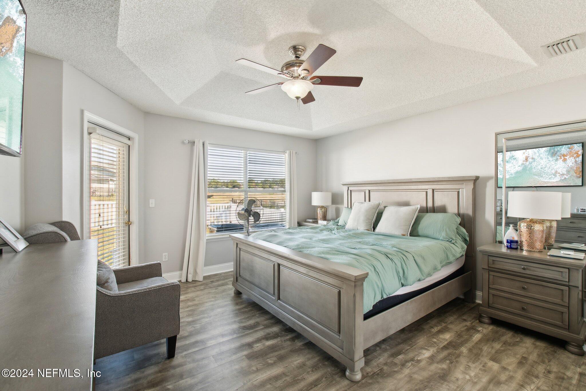 2955 Ravine Hill Drive Middleburg, FL 32068 - Photo 16 of 38 a bedroom with a bed and window