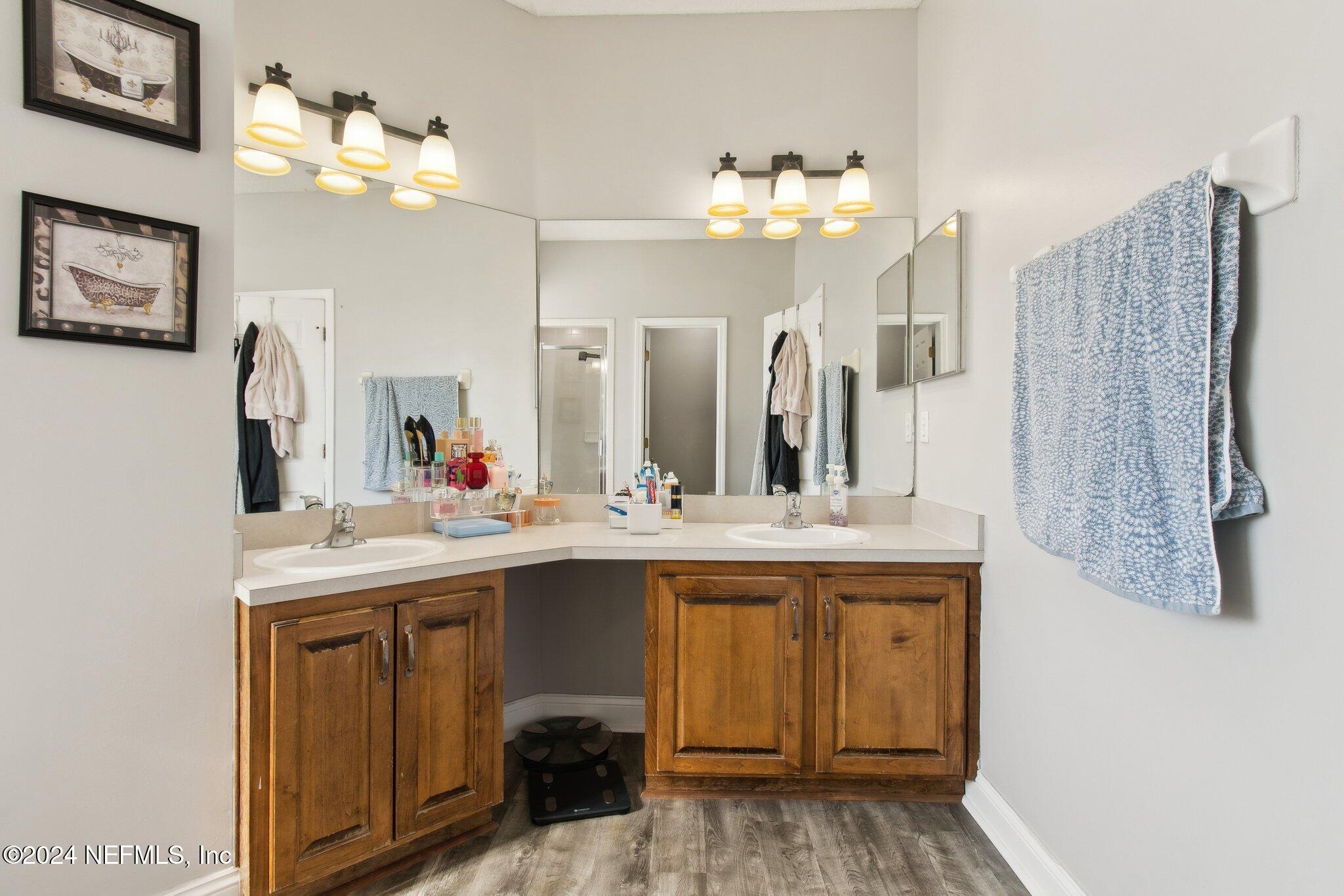 2955 Ravine Hill Drive Middleburg, FL 32068 - Photo 20 of 38 a spacious bathroom with a sink double vanity granite and a mirror