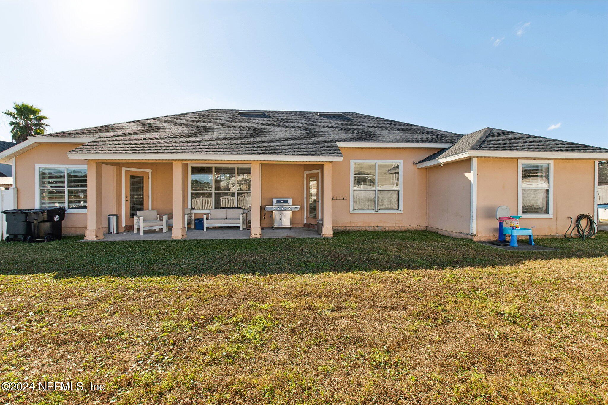 2955 Ravine Hill Drive Middleburg, FL 32068 - Photo 33 of 38 a front view of a house with a garden