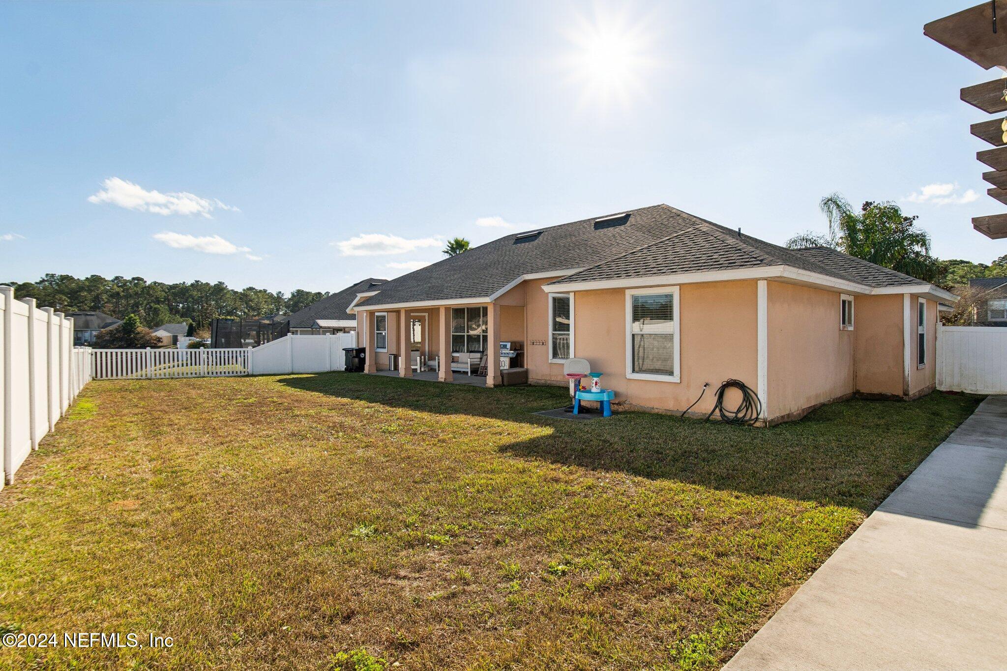 2955 Ravine Hill Drive Middleburg, FL 32068 - Photo 34 of 38 a view of a house with a yard