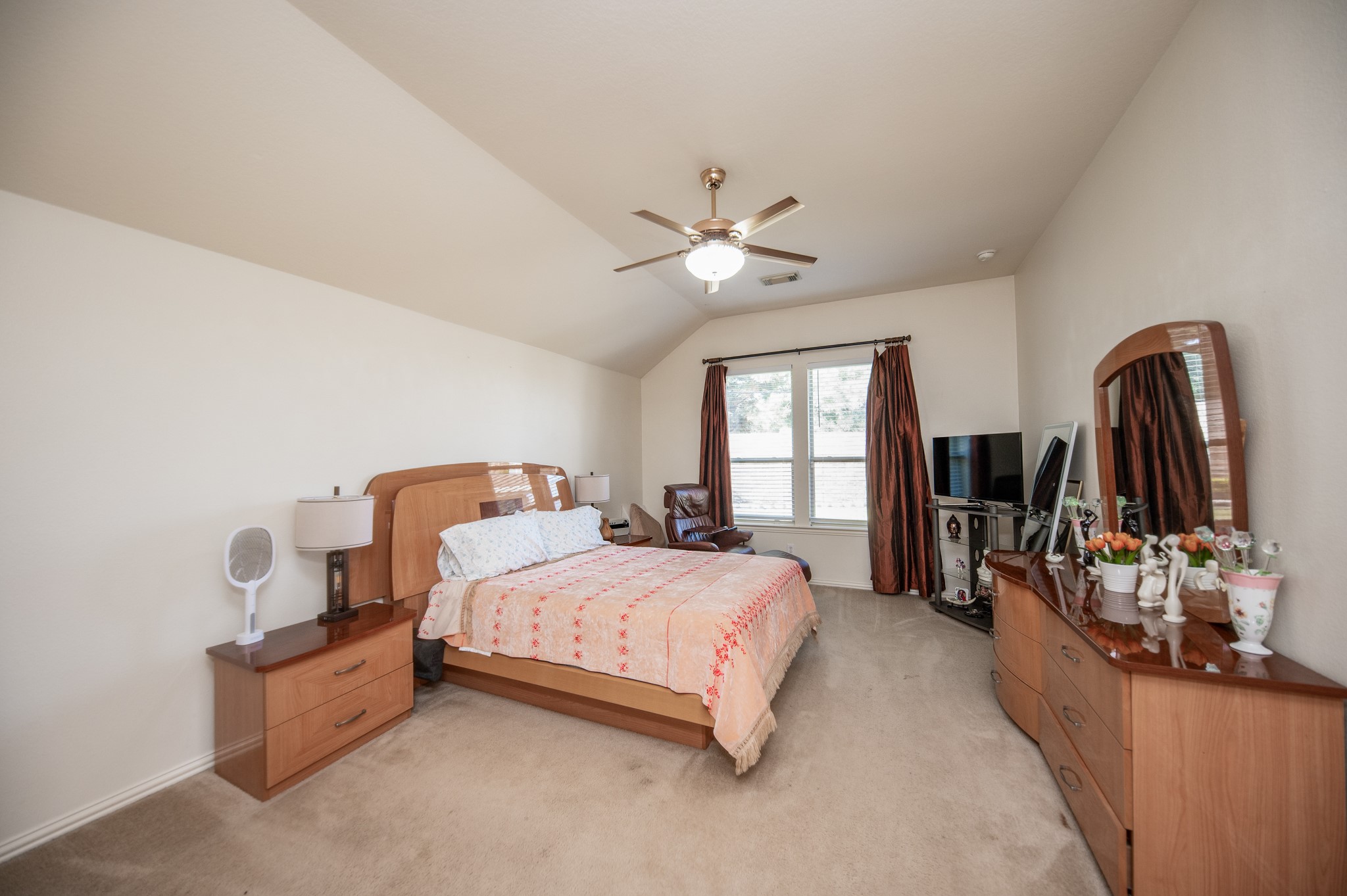 9034 Necklace Tree Lane Katy, TX 77494 - Photo 18 of 33 a bedroom with bed and window