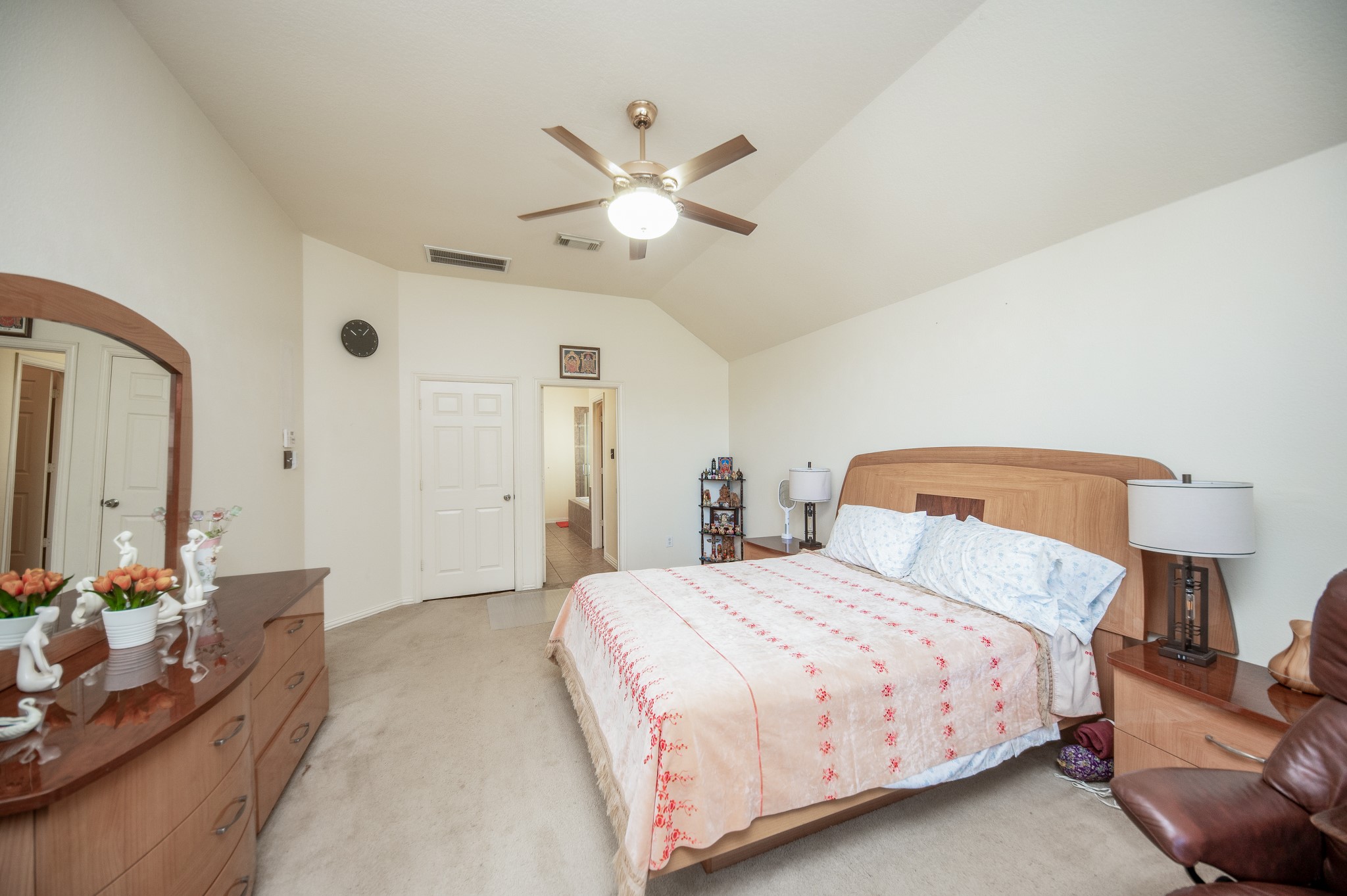 9034 Necklace Tree Lane Katy, TX 77494 - Photo 19 of 33 a bedroom with a bed and lamp