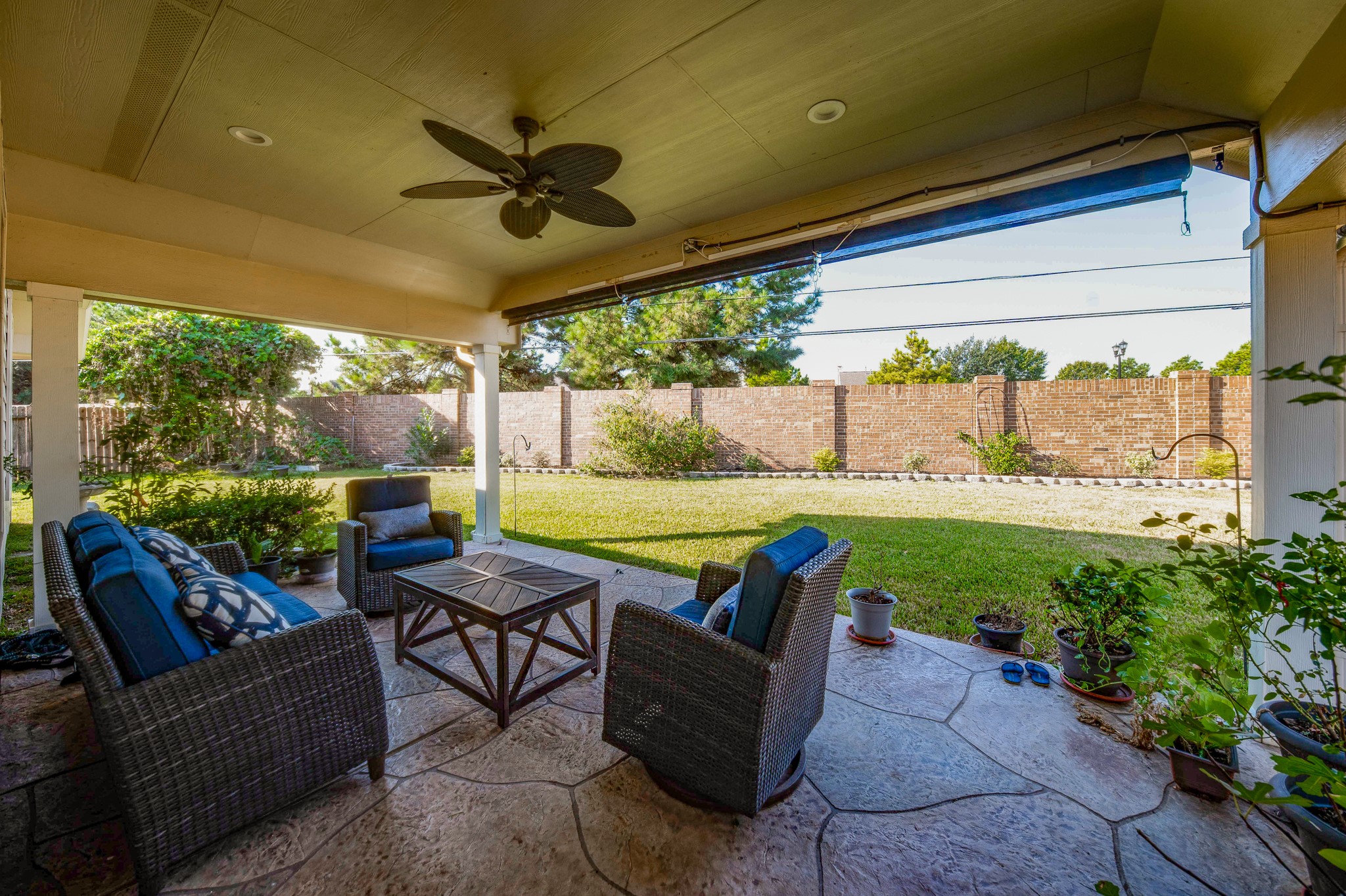 9034 Necklace Tree Lane Katy, TX 77494 - Photo 28 of 33 a outdoor living space with furniture and garden view