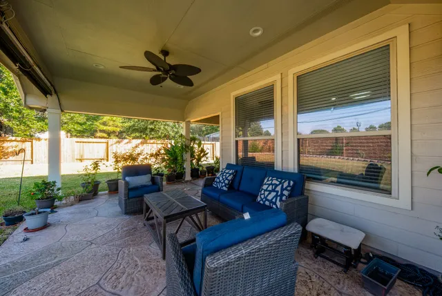 a outdoor living space with furniture and garden view
