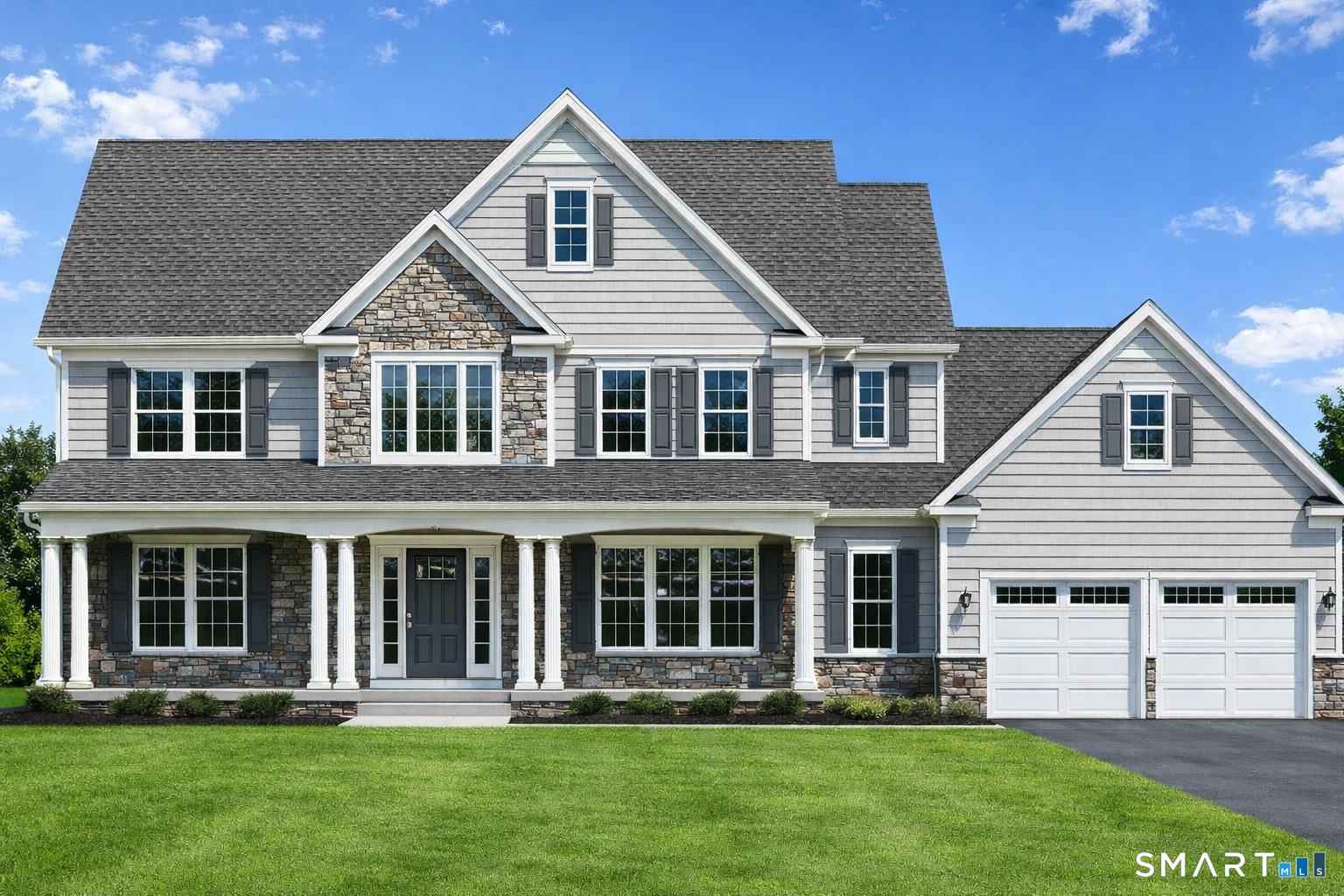 a front view of a house with a yard