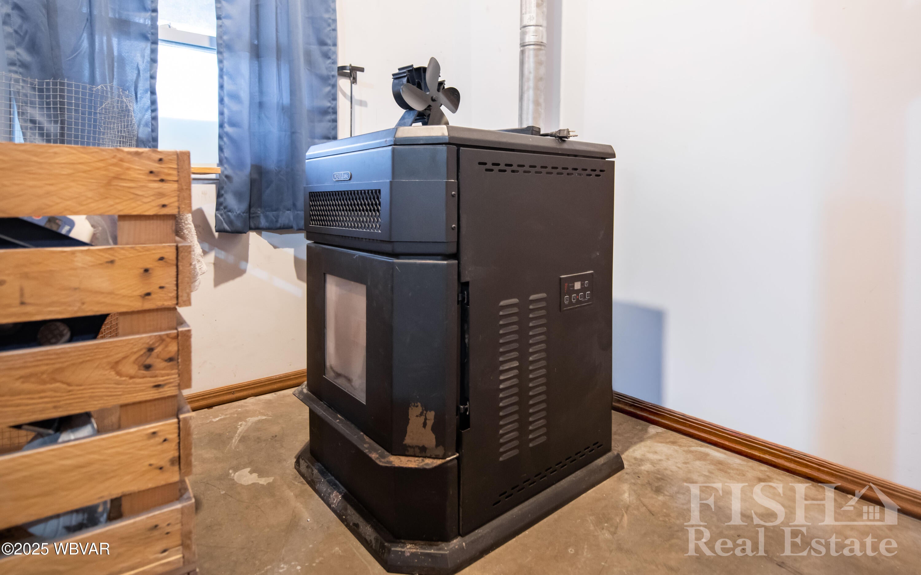 491 Almost Country Road Cogan Station, PA 17728 - Photo 18 of 25 Pellet Stove