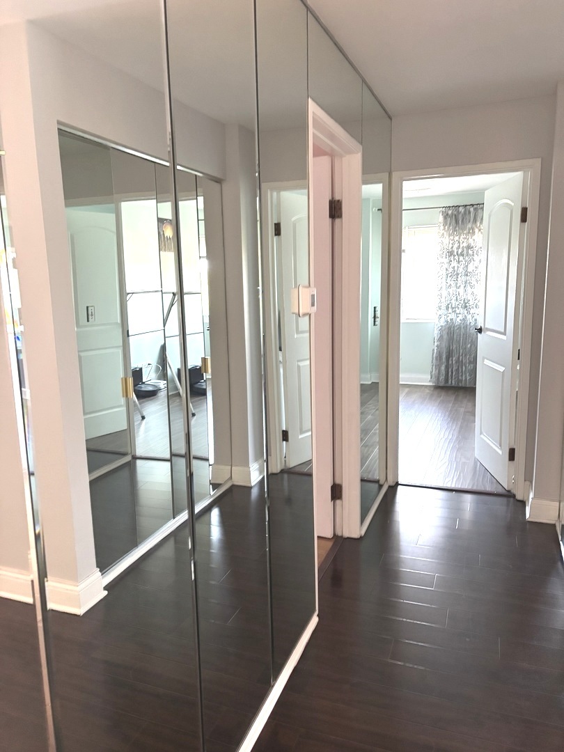 9332 Landings Lane, Unit 504 Des Plaines, IL 60016 - Photo 12 of 18 a view of entryway with wooden floor
