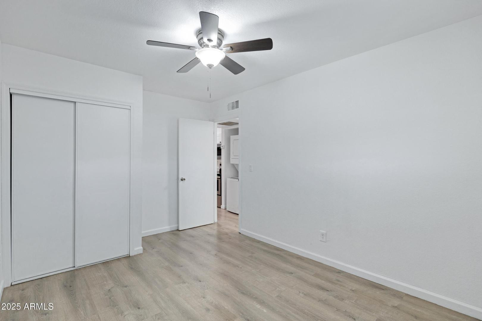 18202 North Cave Creek Road Phoenix, AZ 85032 - Photo 11 of 20 wooden floor in an empty room