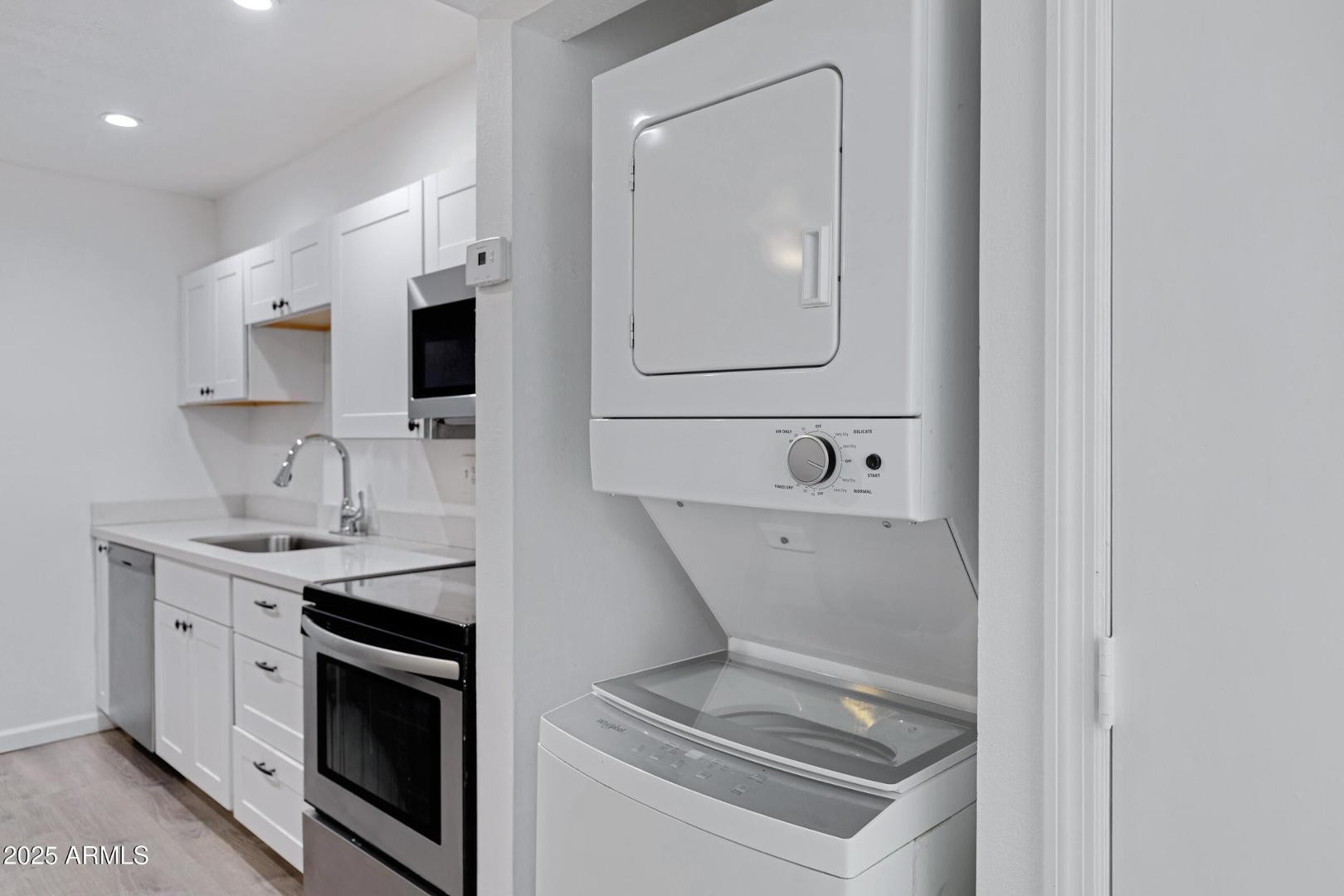 18202 North Cave Creek Road Phoenix, AZ 85032 - Photo 15 of 20 a view of a sink and a microwave