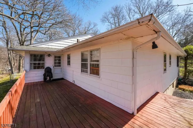 a view of house with a swimming pool