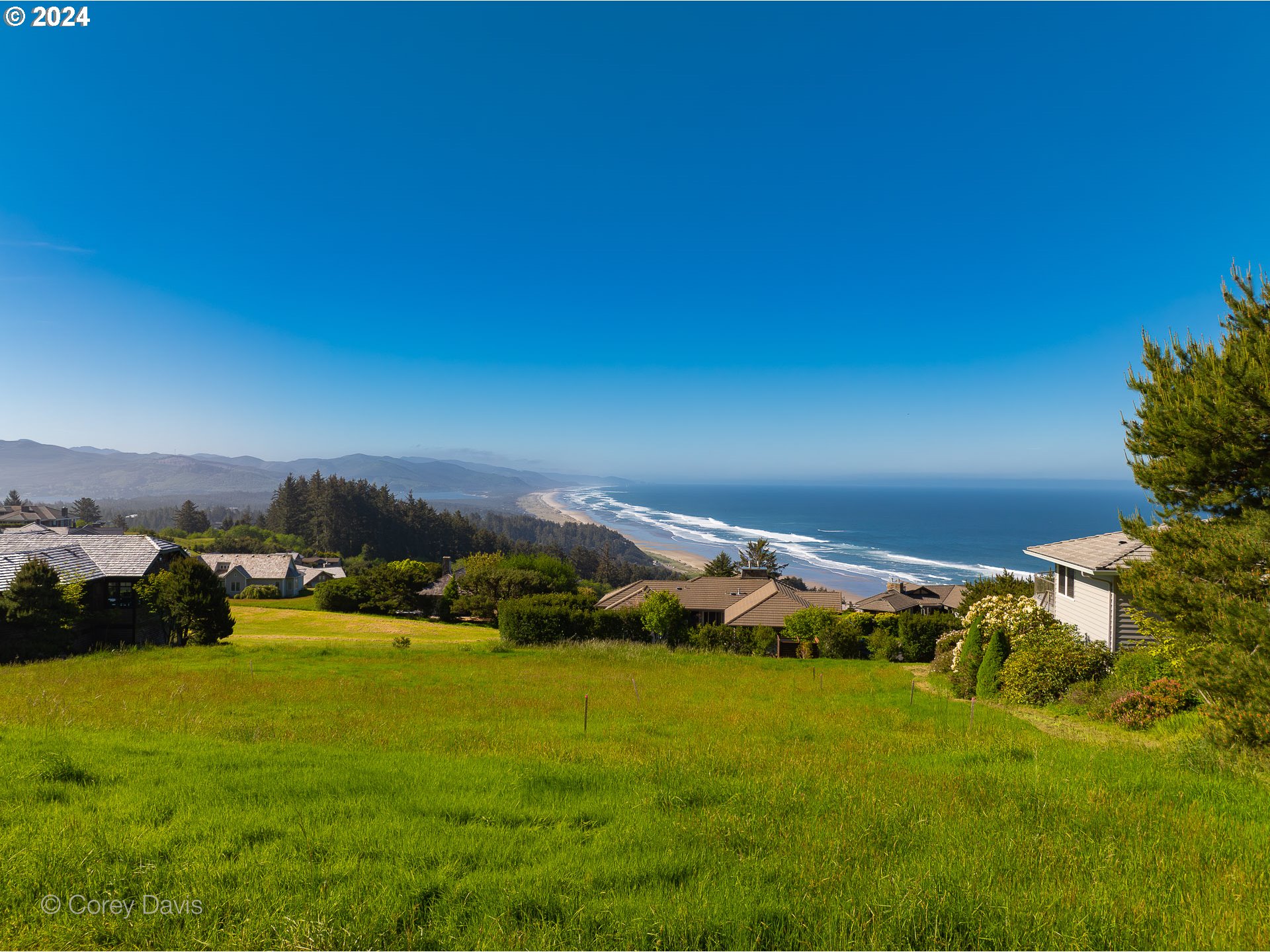 Meadow Loop, Unit 14 Nehalem, OR 97131 - Photo 22 of 22 a view of an ocean yard and outdoor seating