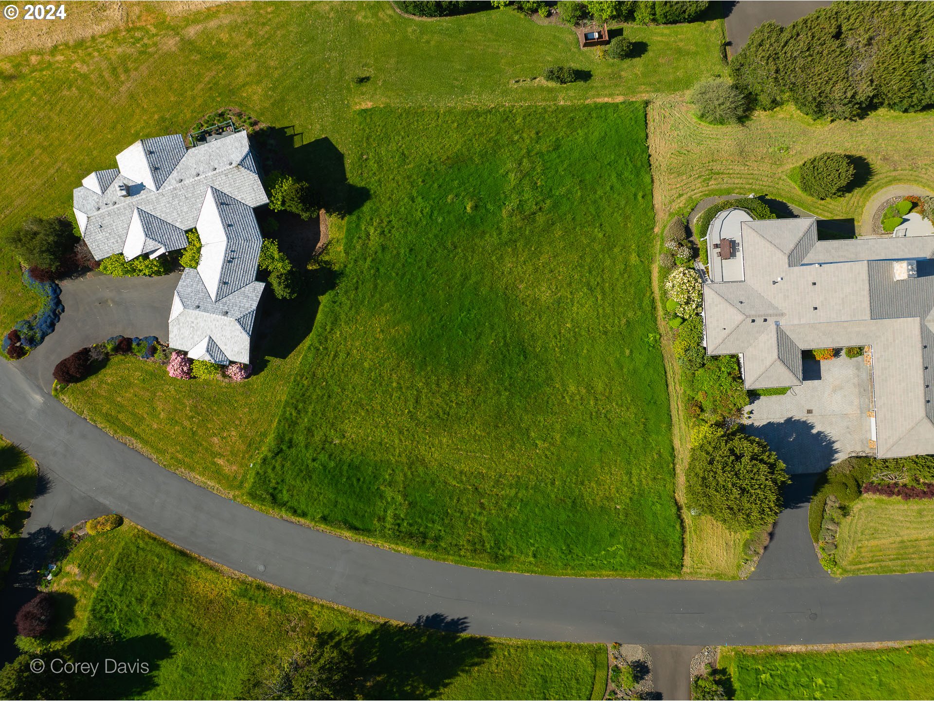 Meadow Loop, Unit 14 Nehalem, OR 97131 - Photo 3 of 22 an aerial view of residential houses with outdoor space and street view