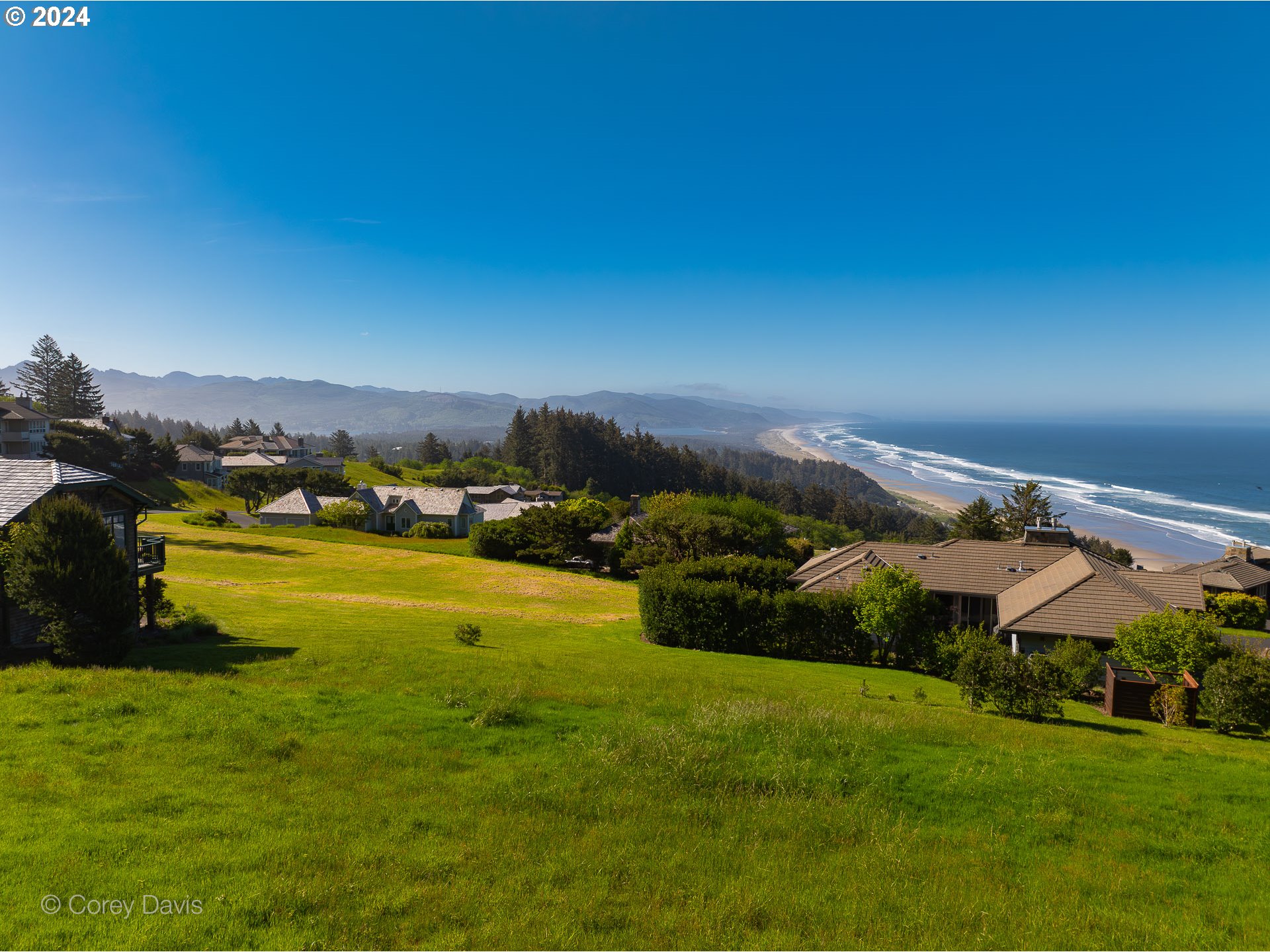 Meadow Loop, Unit 14 Nehalem, OR 97131 - Photo 6 of 22 a view of a city with lawn chairs
