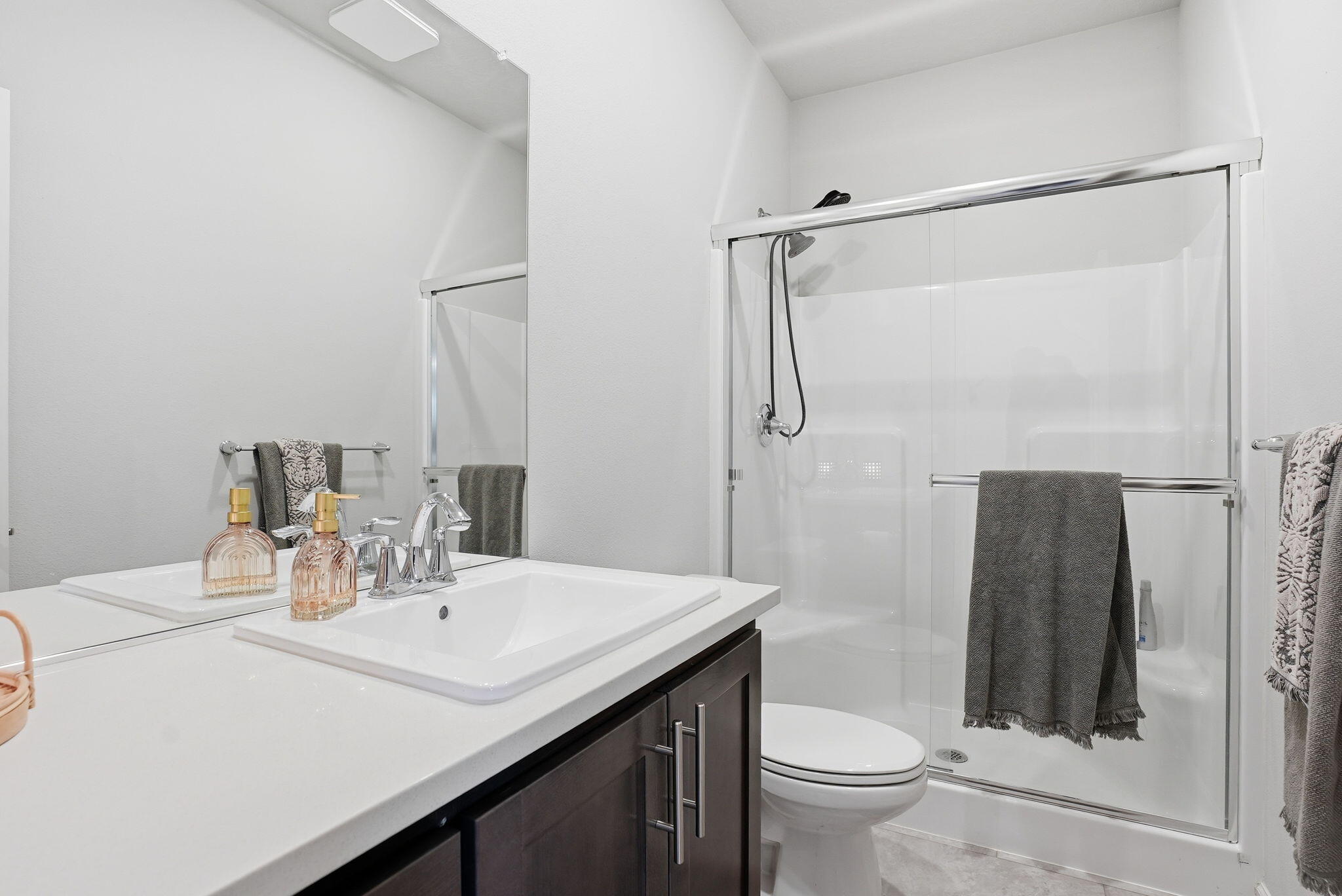 4015 Southwest Quartz Place Redmond, OR 97756 - Photo 14 of 35 a bathroom with a sink toilet and shower