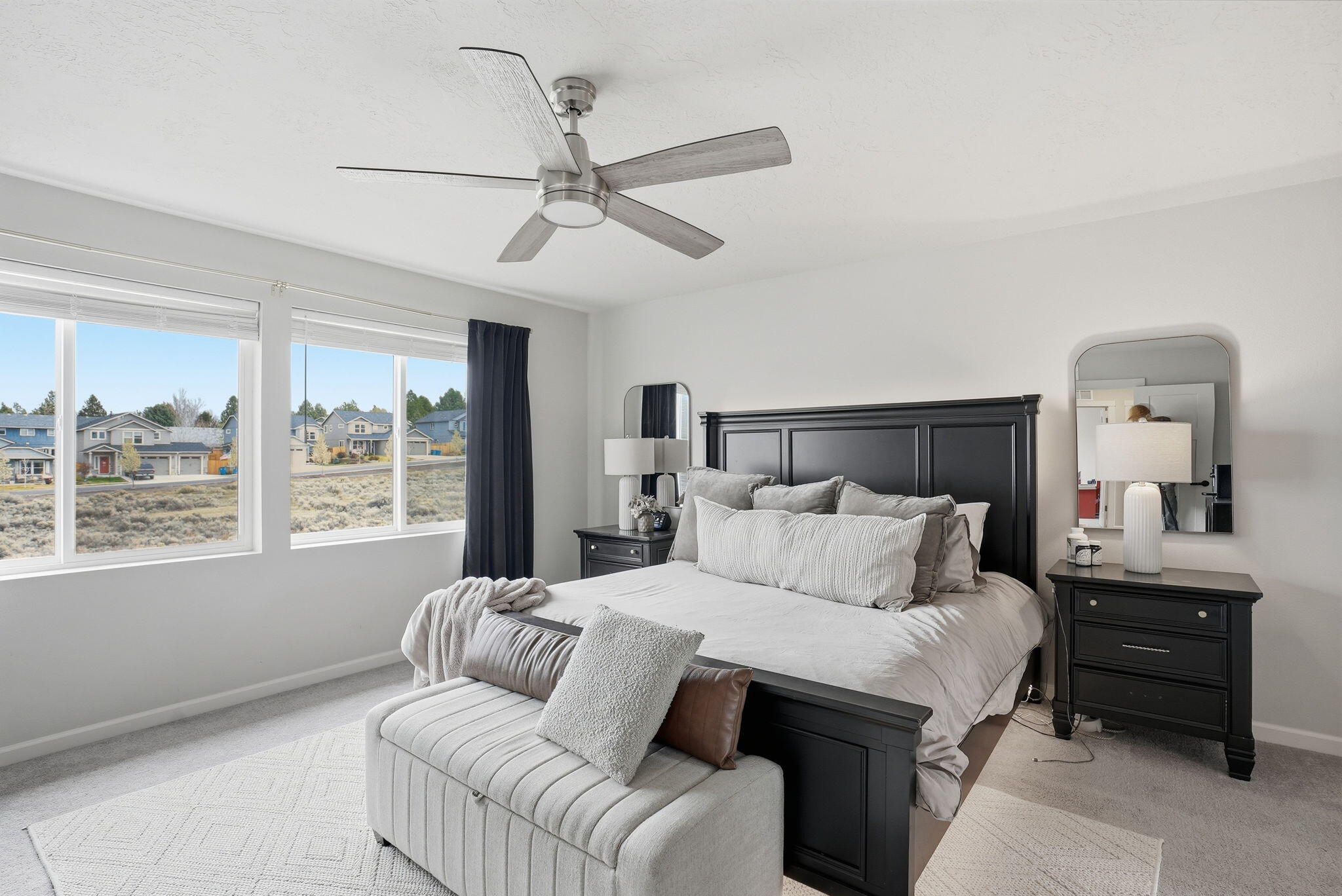 4015 Southwest Quartz Place Redmond, OR 97756 - Photo 15 of 35 a bedroom with a large bed and a window