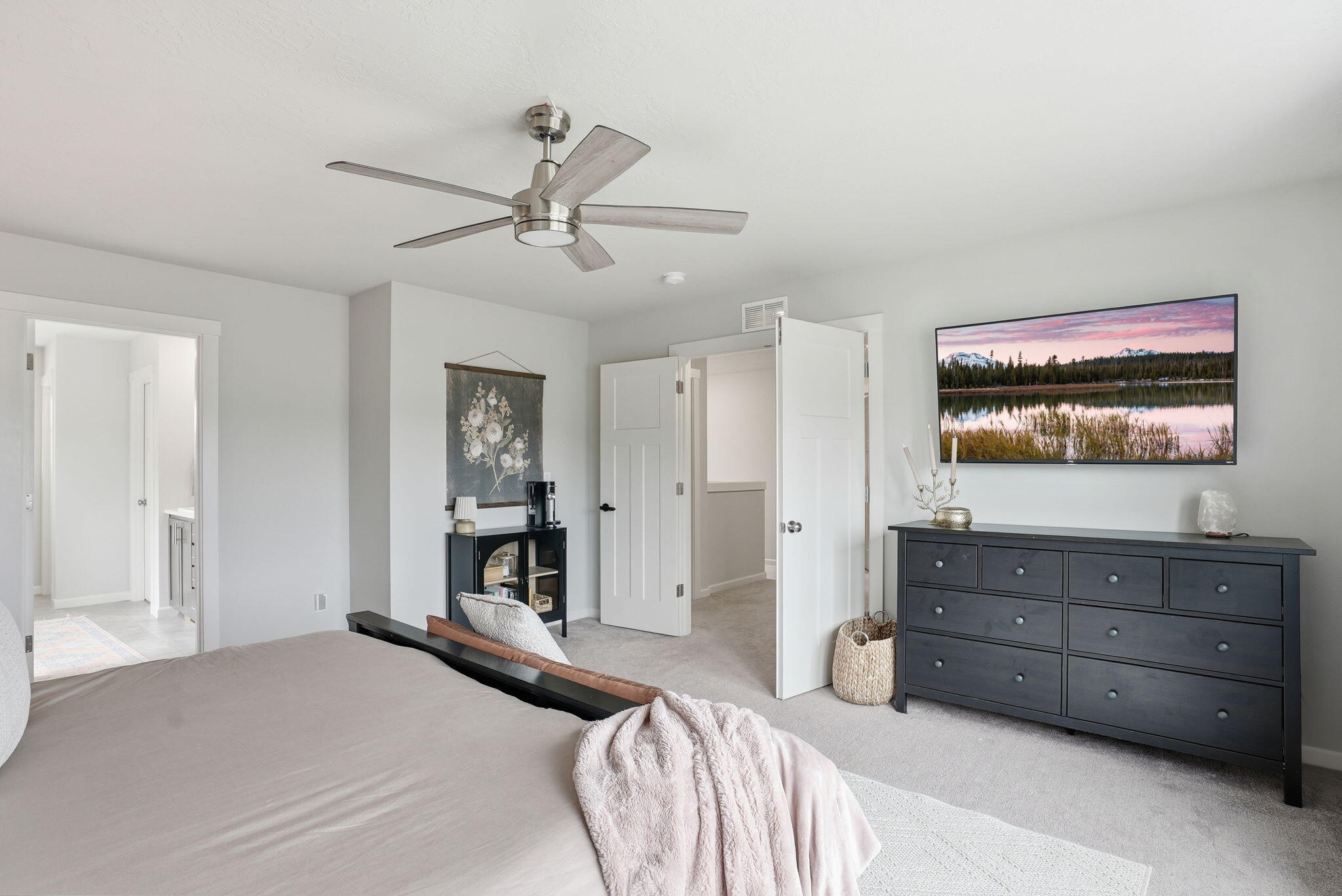 4015 Southwest Quartz Place Redmond, OR 97756 - Photo 16 of 35 a bedroom with a bed and a dresser