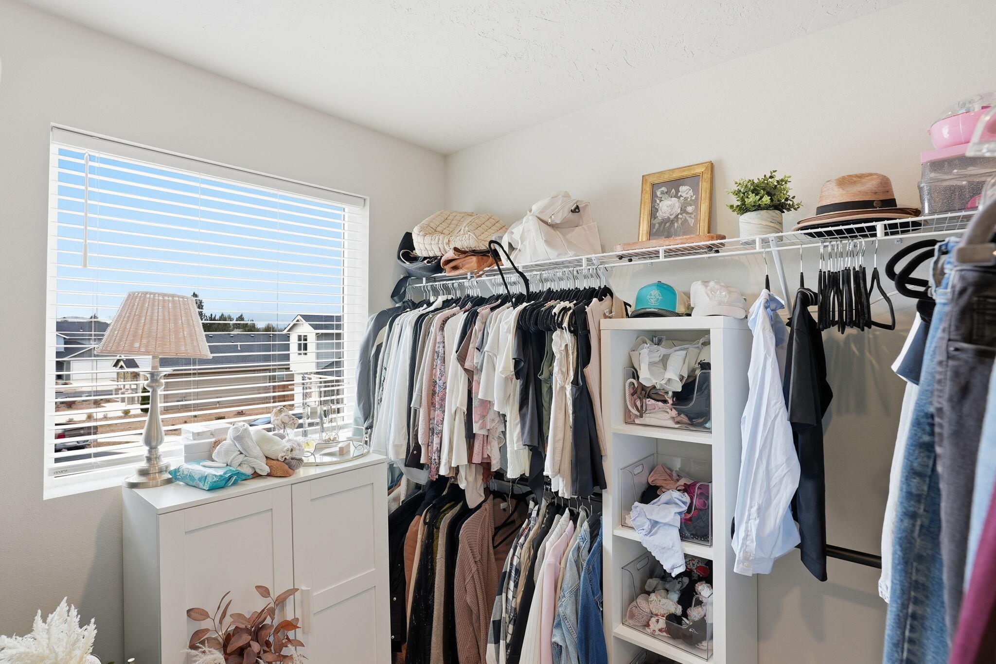 4015 Southwest Quartz Place Redmond, OR 97756 - Photo 20 of 35 a view of walk in closet with clothes and shoes